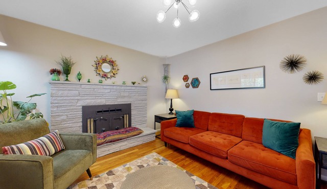 Artsy retreat with a large yard, playground, covered patio