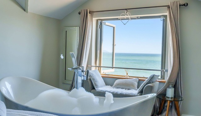 As seen on TV! Luxurious Beach Front Cottage with Hot Tub, Log Burner & Sea Views