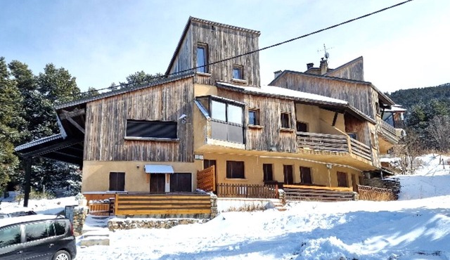 At the bottom of the track, 100 meters from the lifts