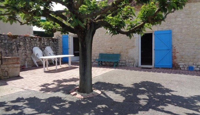 At the end of the village.