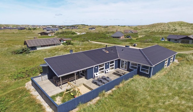 At the narrowest point of the 35 km long headland Holmsland Klit, which separates the roaring North