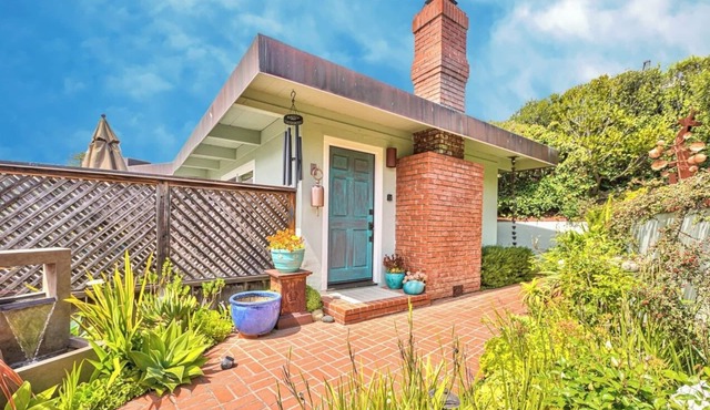 "Atherton Cottage has been remodeled & has two Fireplaces!