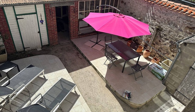 Attractive central town house with local parking, tobacconist, baker, ATM.