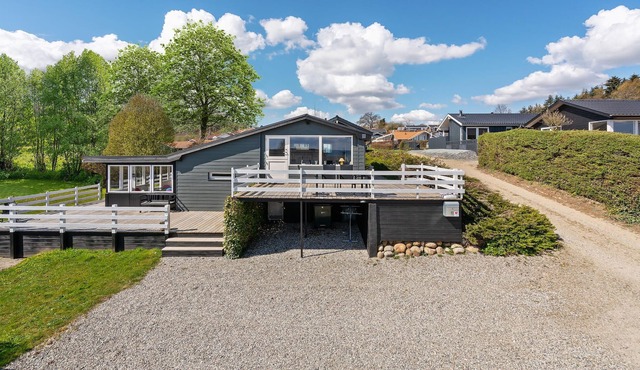 Attractive cottage with beautiful winter garden and sea view near the beach.
