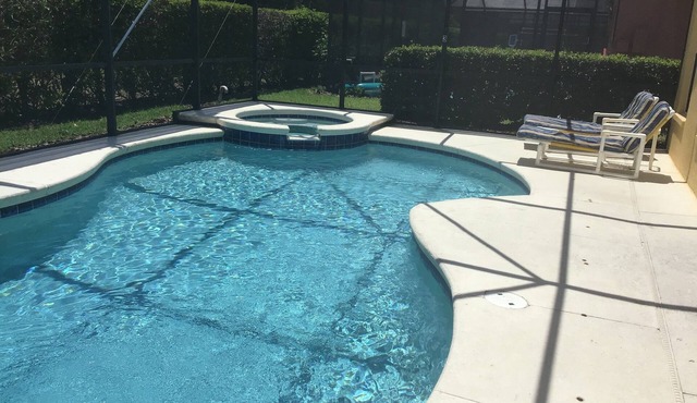 Attractive, spacious holiday villa. Heated pool/spa included and free internet.