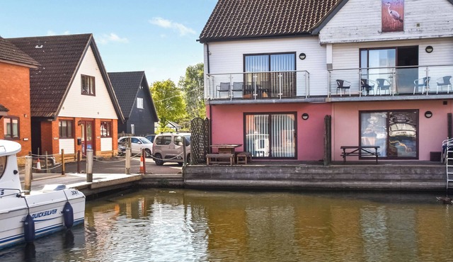 Attractive "upside down" waterside home, with four en-suite bedrooms.