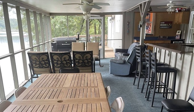 Auburn Game day Lake house with extra large back porch and floating dock