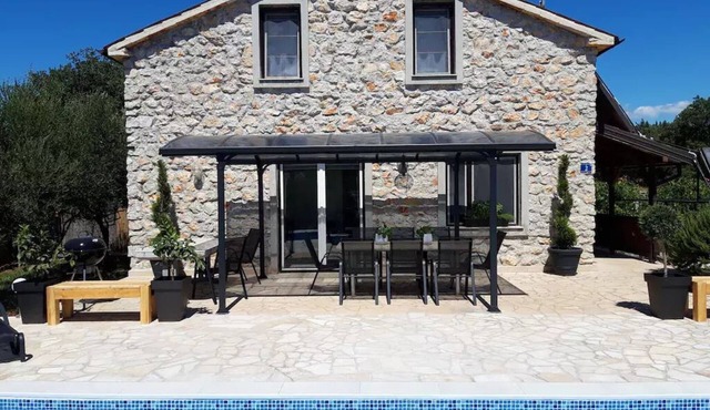 Authentic stone house with great pool and large garden!