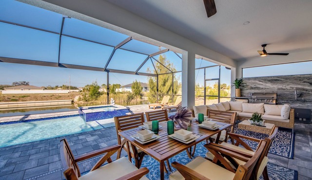 Awesome 4 BR/3 bath waterfront villa w. heated pool, hot tub, kayaks, fishing poles, bikes