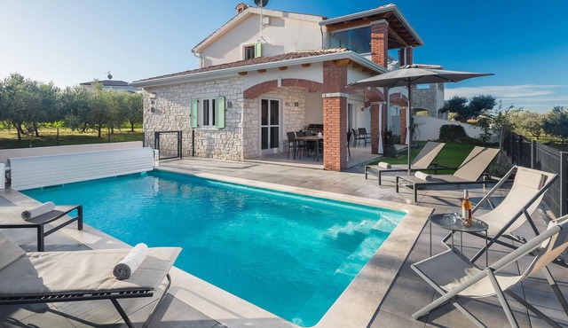Awesome home in Buzinija with private swimming pool, can be inside or outside