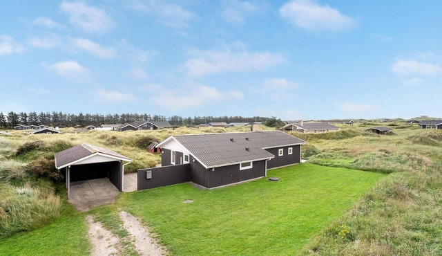 Awesome home in Løkken with sauna