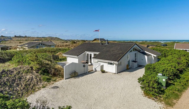 Awesome home in Løkken with sauna