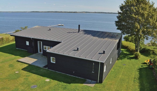 Awesome home in Roslev with house sea view