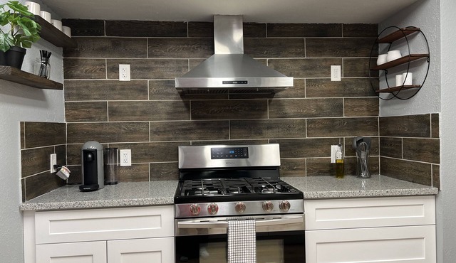 Awesome remodeled home with a movie room and a massive backyard with a firepit