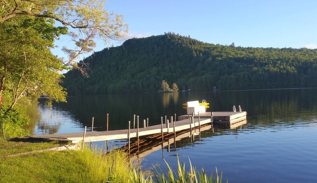 Awesome unique home right on the lake with huge yard, hot tub near Sunday river