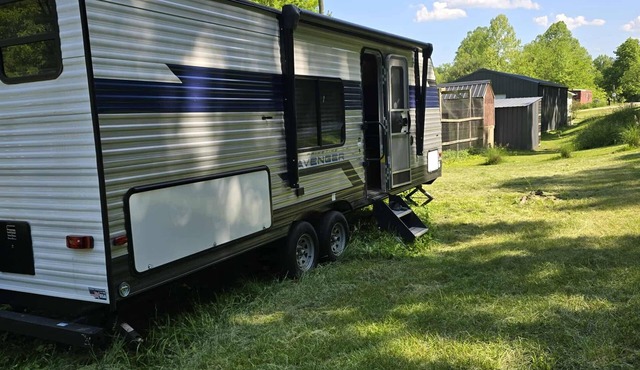Back road camper in New Straitsville on monday creek and by old mans cave.