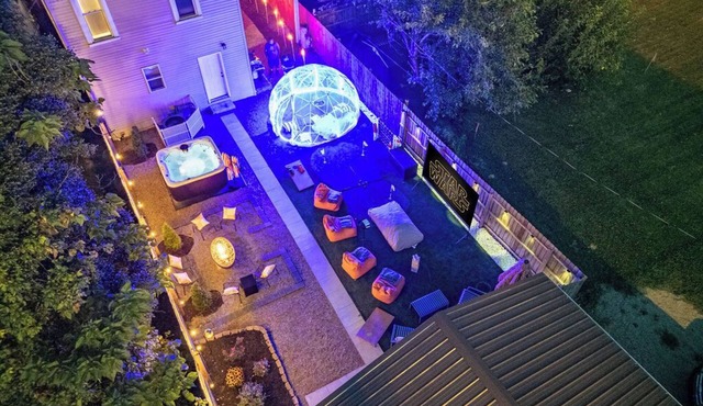Backyard Escape: Outdoor Movie, Dome, Mini Golf, hot tub, fire pit, grill, mural