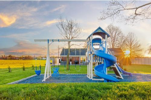 Backyard Getaway Amish Farmland Hot tub Fire pit