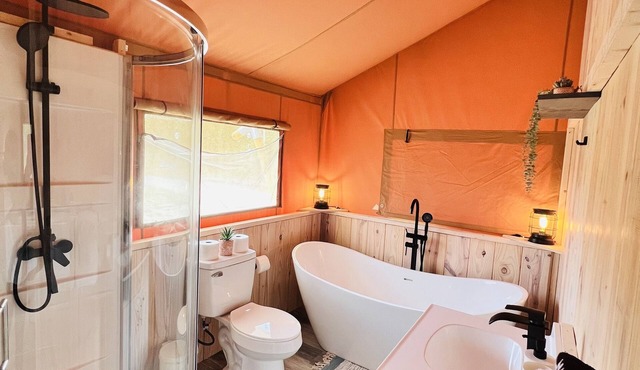 Backyard glamping with hot tub
