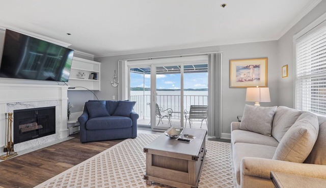 Balcony Bliss Over Lake Charlevoix | Waterfront Stay With Patio | Fireplace |