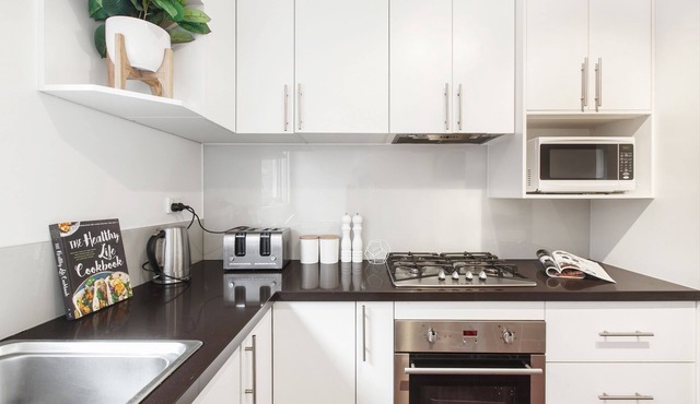 Balcony Retreat Apartment by Ready Set Host