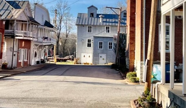 Bank Loft with Original Vault in River Town