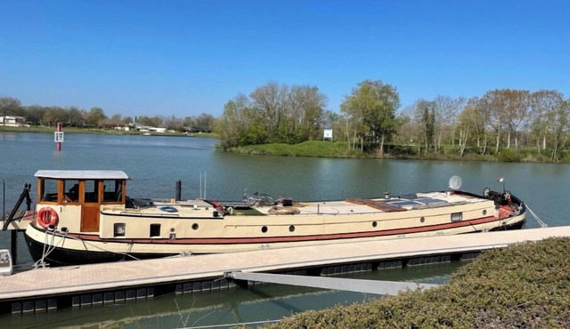 Barge in Saintes-Maries-de-la-Mer on the Petit Rhône