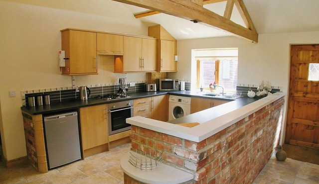 Barn conversion set on a small farm which enjoys lovely countryside views.