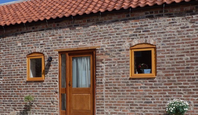 Barn conversion on small working farm