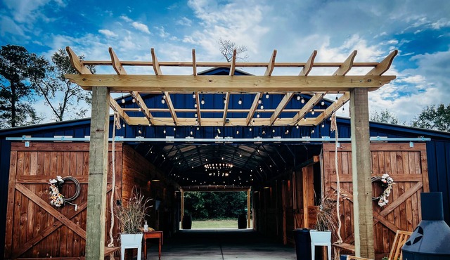 Barn Venue apartment with kids games, fire pits, and animal feeding.