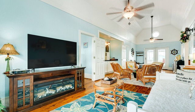 Bay and gulf-view home with gas grill, deck, and outdoor seating area