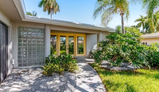 Bay Breezes is a waterfront home in a gated community minutes from the beach.