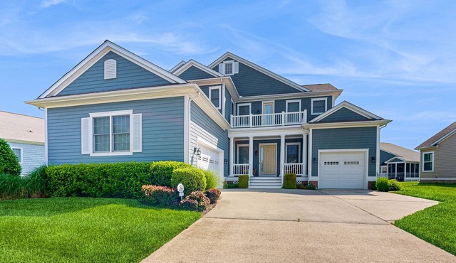 Bayside Resort home with sunroom plus pools, gym, hot tub, & sports courts