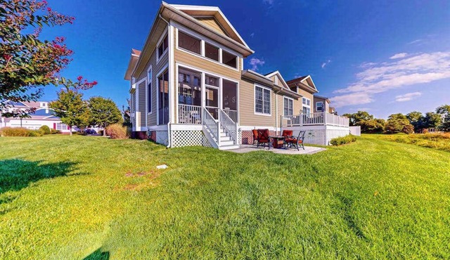 Bayside Resort townhome with nautical-theme, resort amenities, & water views