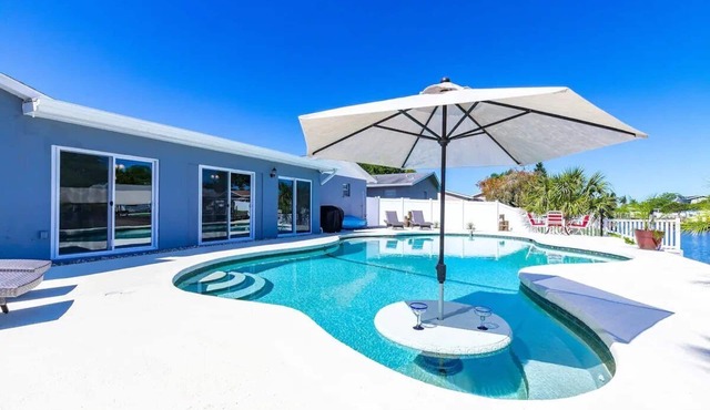 Bayside Retreat with Backyard Oasis