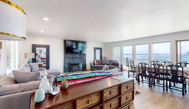 Bayview home with a deck overlooking the locally famous Ghost Hole fishing spot