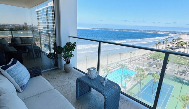 Beach and city views in condo with backyard access to beach and walkable town.