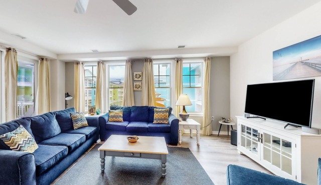 Beach condo with pool views, balcony, outdoor pool & gym