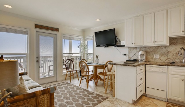 Beach Cottage steps from Surf. fishing. the Beach and Serene Sunsets (1303)