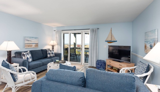 Beach Decor! Gorgeous Sunsets on Pelican Beach! Walk to Pools! Amenity Access included!