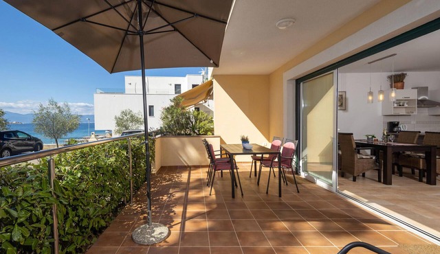 Beach front apartment in Omisalj with WiFi