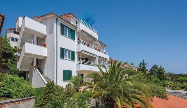 Beach front apartment in Rabac with WiFi