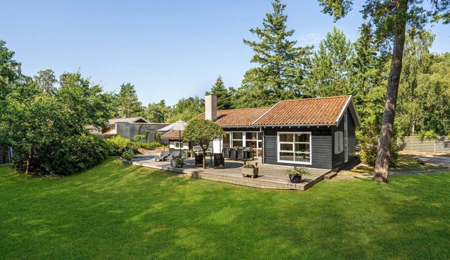 Beach front home in Væggerløse with sauna