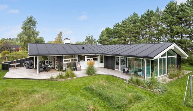Beach front home in Knebel with sauna