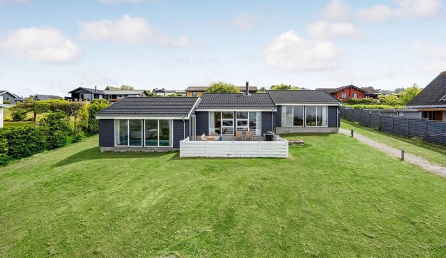 Beach front home in Knebel with sauna