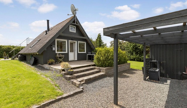 Beach front home in Rønde with WiFi