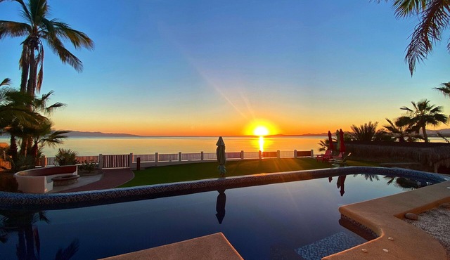 Beach-front luxury! Private home, pool, hot tub, rooftop and water sport access!