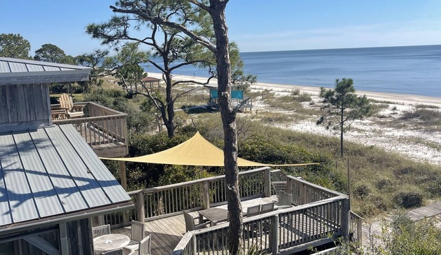 BEACH FRONT to BAY with boatdock, swimming pool, pickleball courts and kayaks.