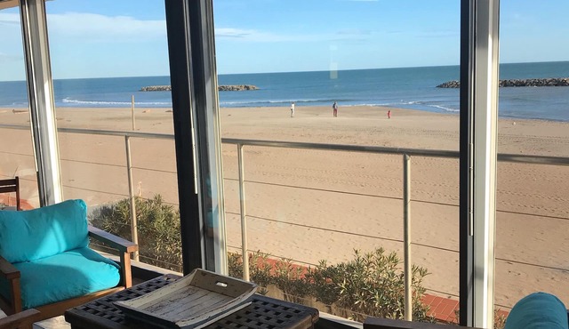 Beach house facing the sea