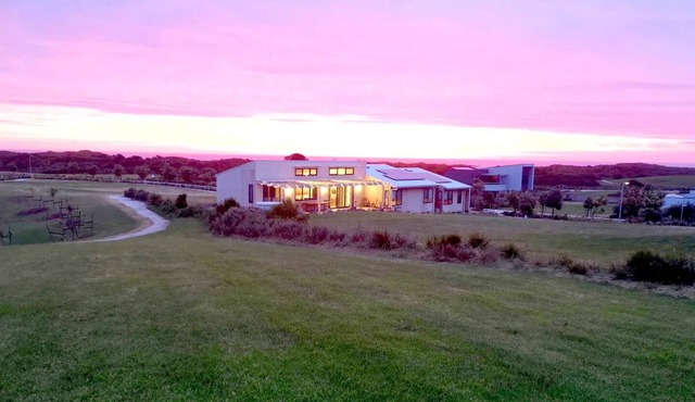 Beach house in award-winning Eco Village surrounded by stunning beaches.nn